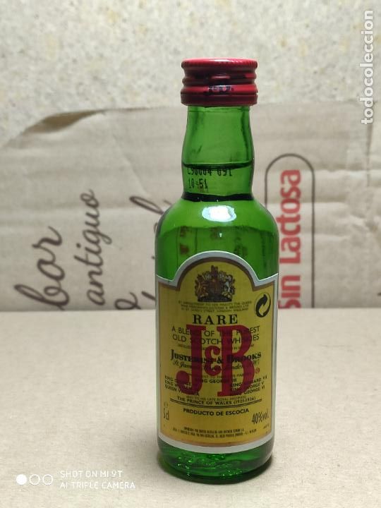 Botellas antiguas: whisky J B MINIATURA - Foto 1