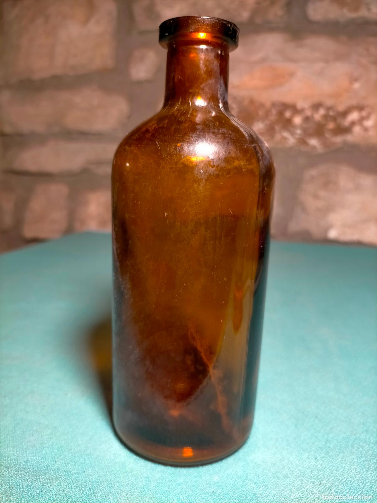 Botellas antiguas: Botella de cristal marr&oacute;n antigua - Foto 1