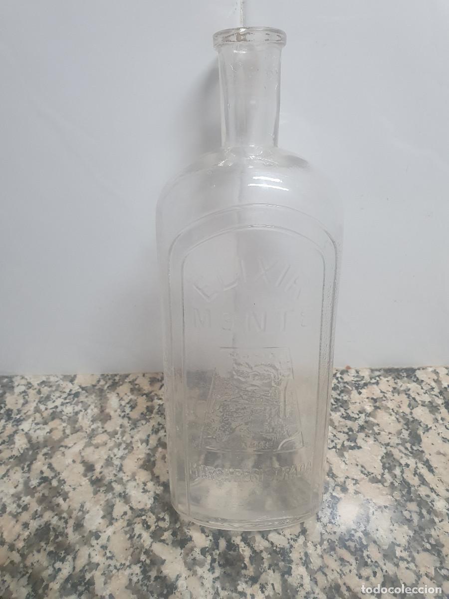 Botellas antiguas: BOTELLA ELIXIR MONTE, LETRAS EN RELIEVE - Foto 1
