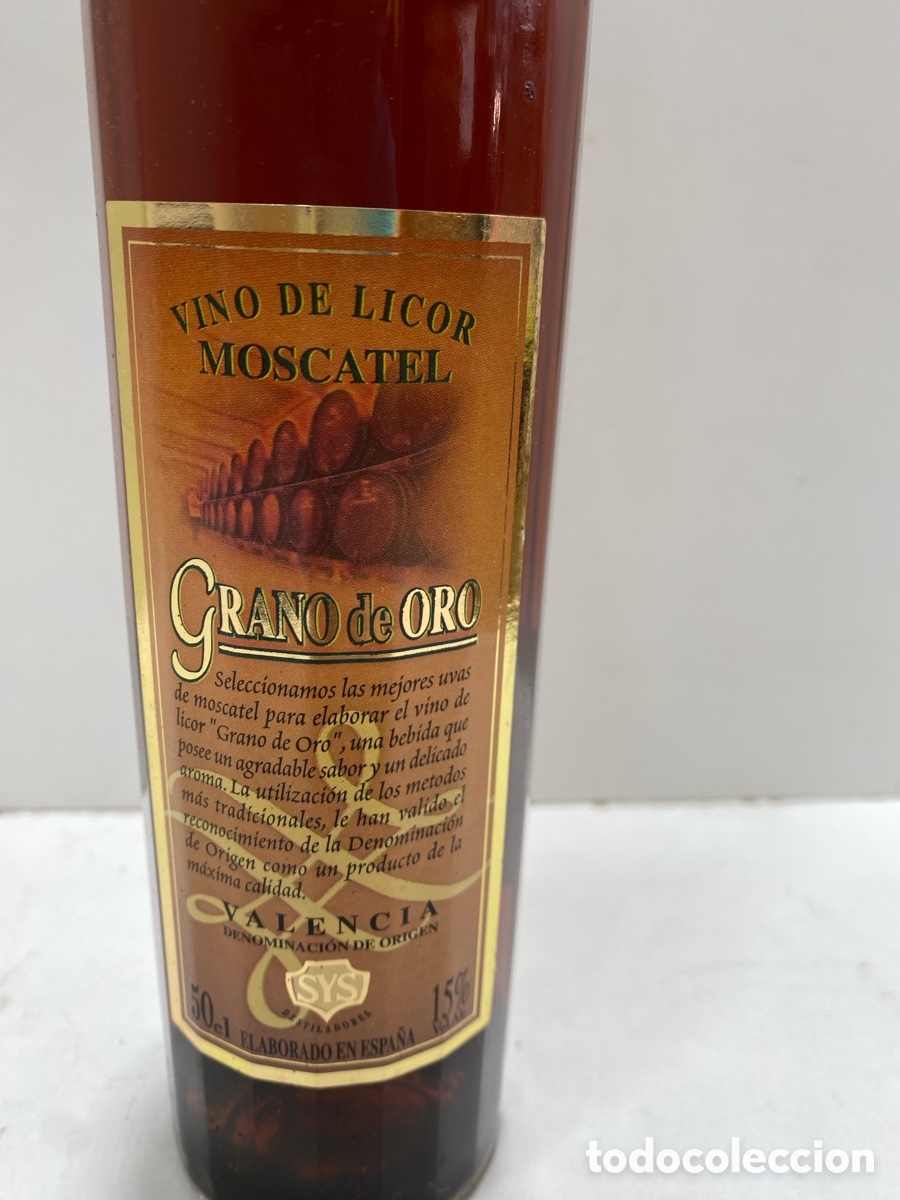 Botellas antiguas: BOTELL&Iacute;N MOSCATEL GRANO DE ORO - Foto 1