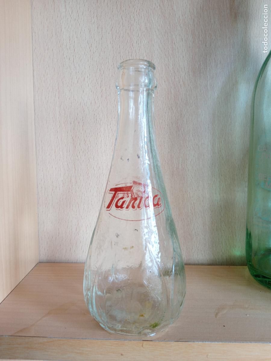 Botellas antiguas: BOTELLA RELIEVE Y SERIGRAFIA TANICA - Foto 2
