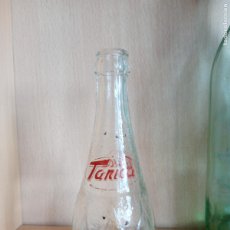 Botellas antiguas: BOTELLA RELIEVE Y SERIGRAFIA TANICA