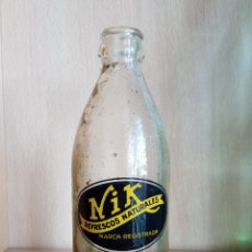 Botellas antiguas: BOTELLA RELIEVE Y SERIGRAFIA REFRESCOS NATURALES NIK
