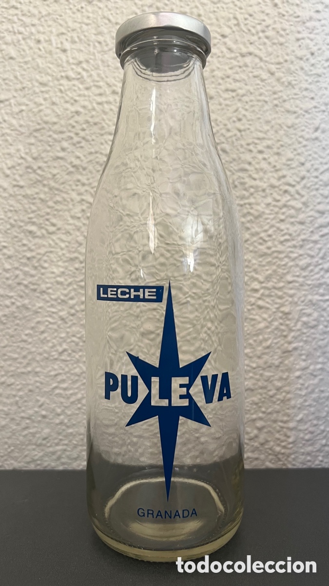 Botellas antiguas: BOTELLA PULEVA DE LITRO TAPON DE ROSCA - Foto 1