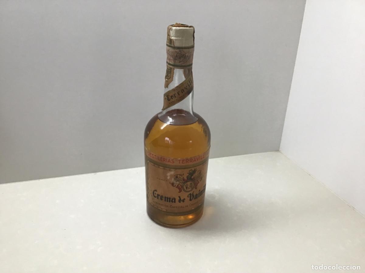 Botellas antiguas: Antigua botella de crema de vainilla - Foto 1