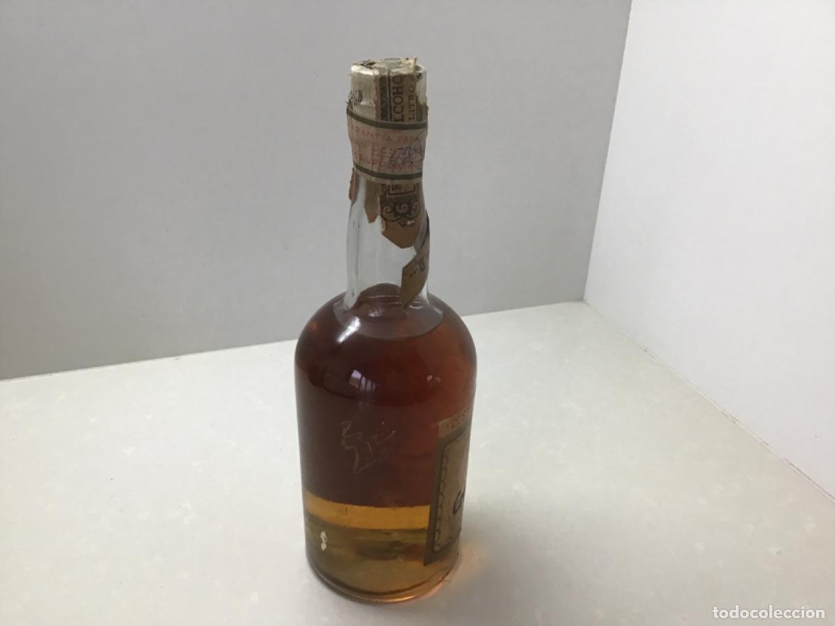Botellas antiguas: Antigua botella de crema de vainilla - Foto 2