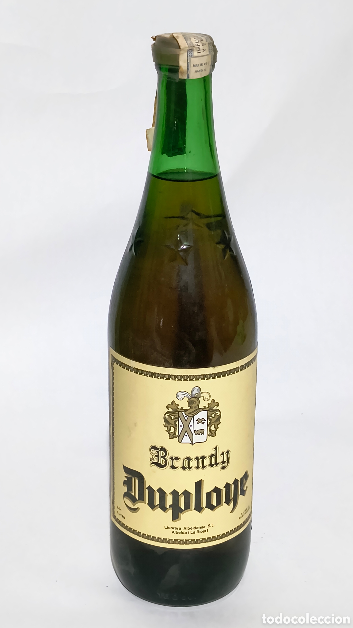 Botellas antiguas: BOTELLA DE BRANDY DUPLOYE. LICORERA ALBERDENSE. S.L. ALBELDA. RIOJA. ESPA&Ntilde;A.