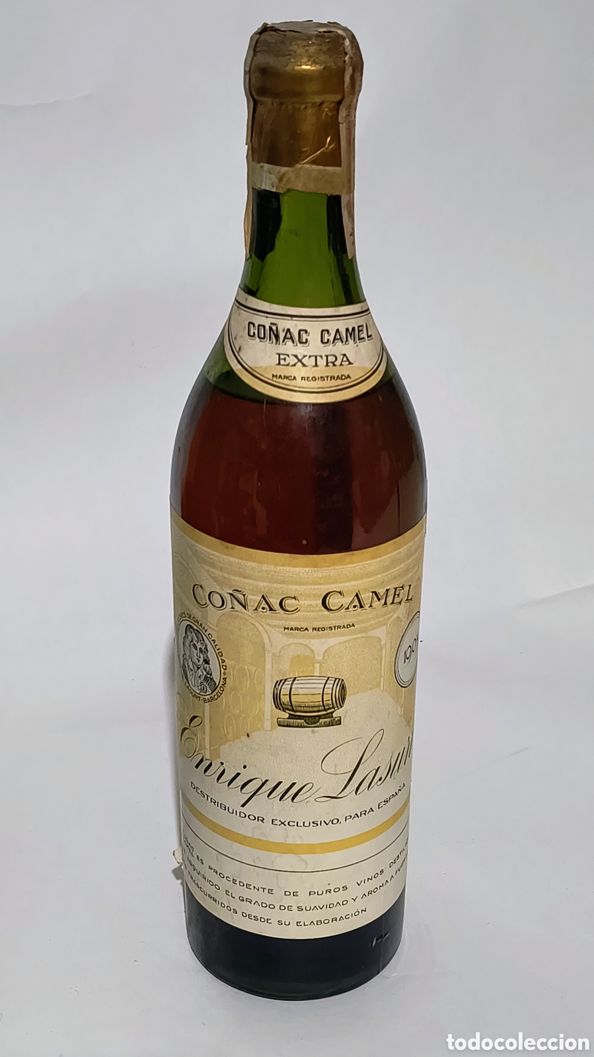 Botellas antiguas: Botella antigua de co&ntilde;ac camel Enrique Lasurt 1905, extra camel, precinto 20 centimos