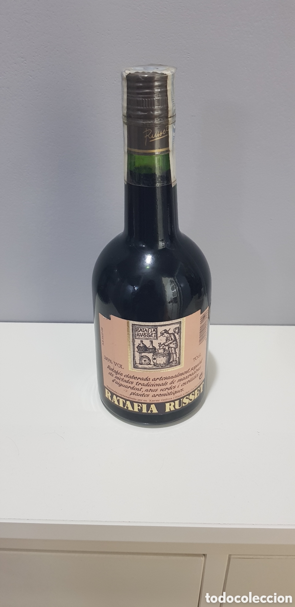 Botellas antiguas: Botella de rafia rusell precintada - Foto 1