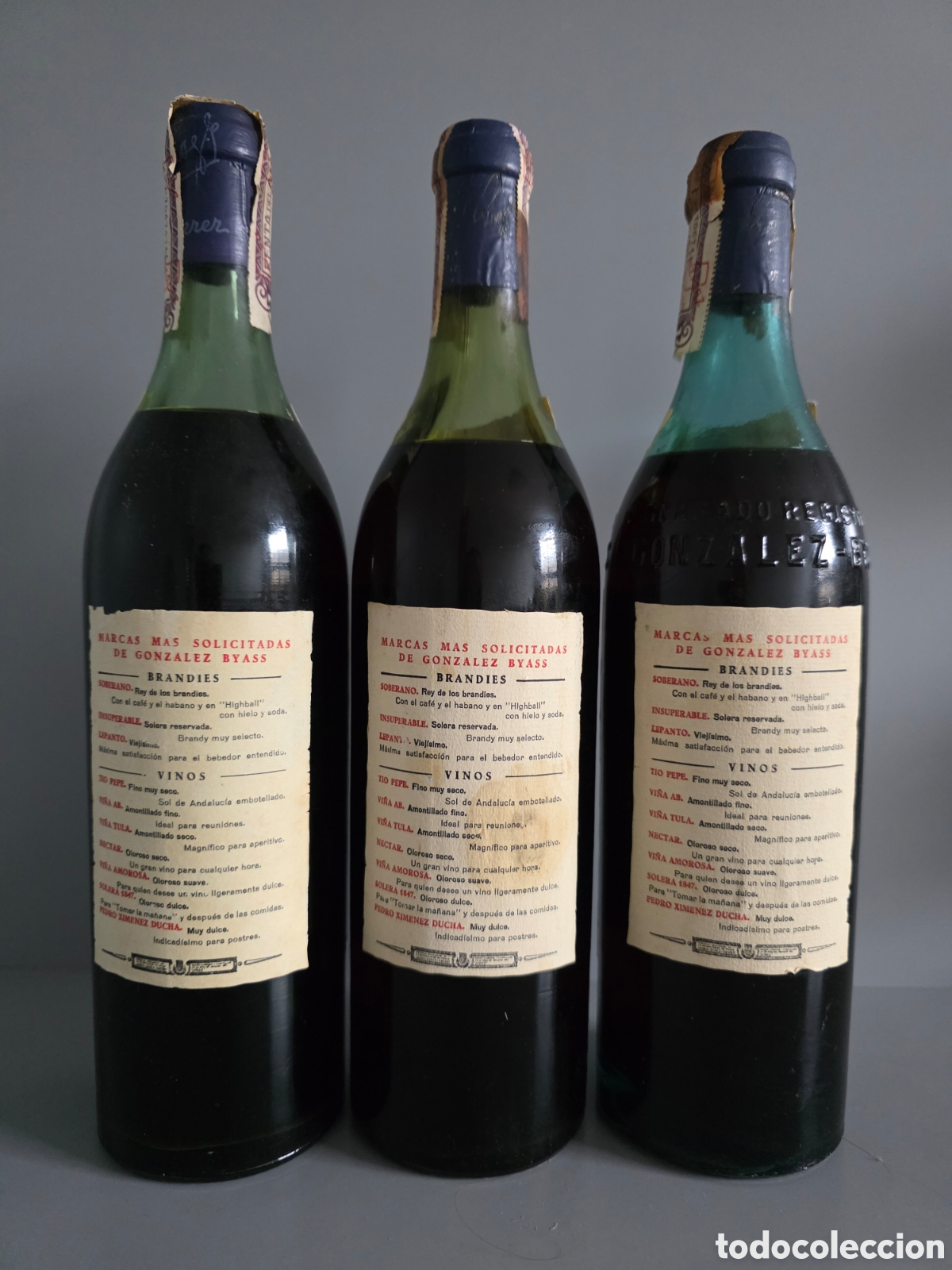 Botellas antiguas: Tres botellas brandy Soberano. 80 centimos - Foto 2