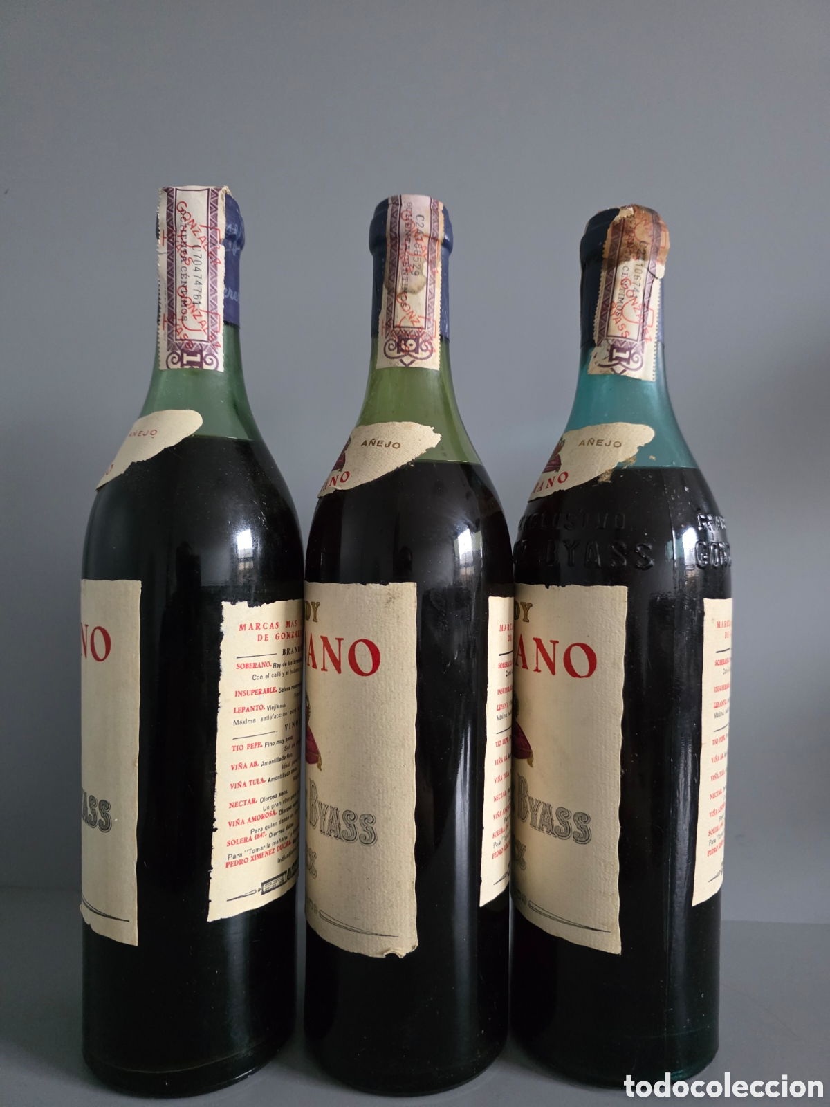 Botellas antiguas: Tres botellas brandy Soberano. 80 centimos - Foto 3