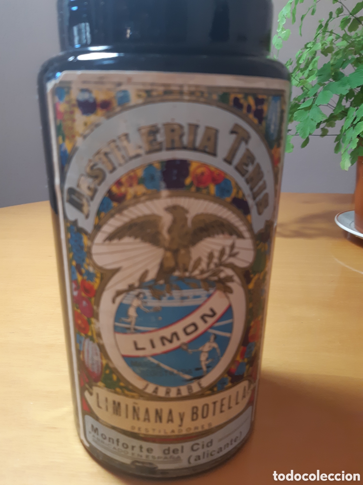 Botellas antiguas: Botella jarabe de lim&oacute;n Tenis - Foto 1