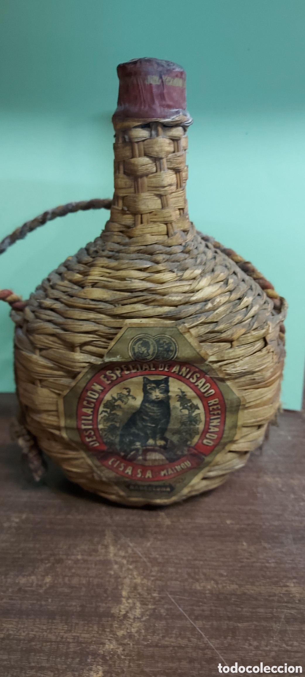 Botellas antiguas: PEQUE&Ntilde;A GARRAFA DE ANISADO REFINADO - Foto 1