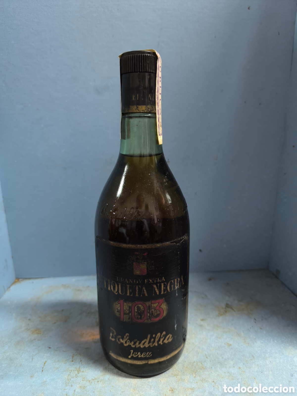Botellas antiguas: BRANDY EXTRA ETIQUETA NEGRA 103 - Foto 1