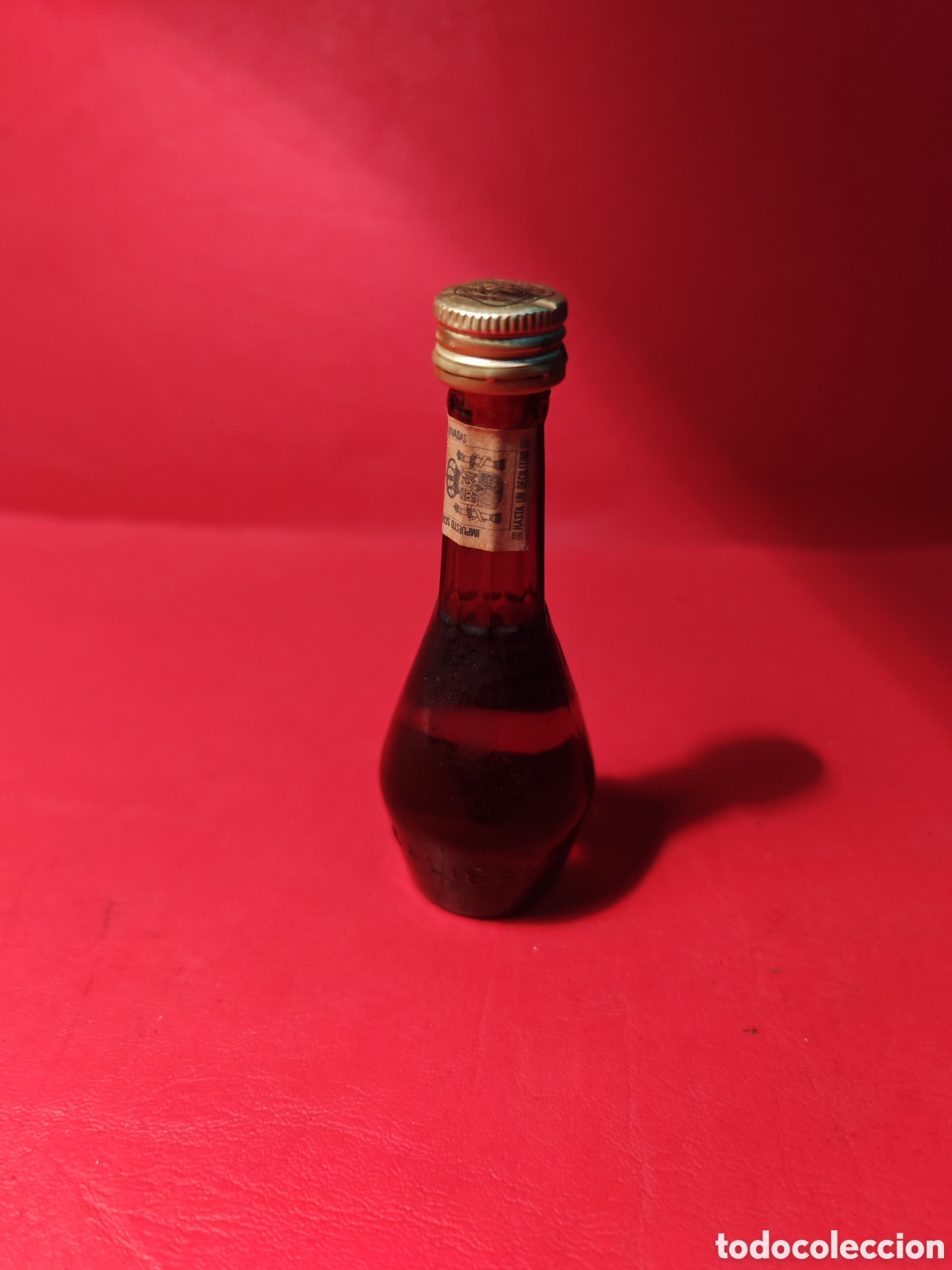 Botellas antiguas: Antigua mini botella de licor Calisay - Foto 2