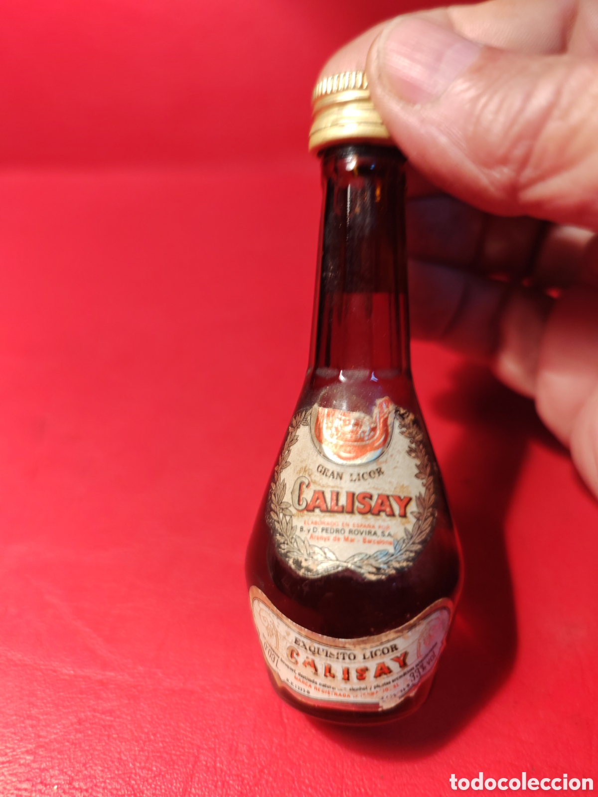 Botellas antiguas: Antigua mini botella de licor Calisay - Foto 4