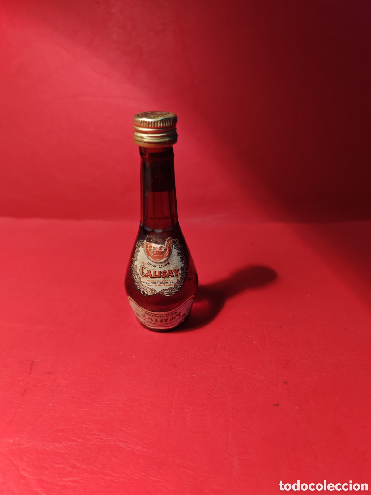 Botellas antiguas: Antigua mini botella de licor Calisay - Foto 1