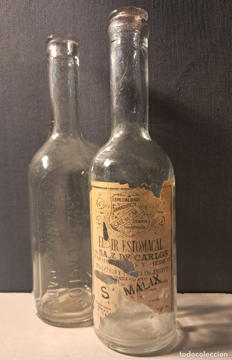 Botellas antiguas: DOS BOTELLINES ELIXIR DR. SAIZ DE CARLOS - Foto 1