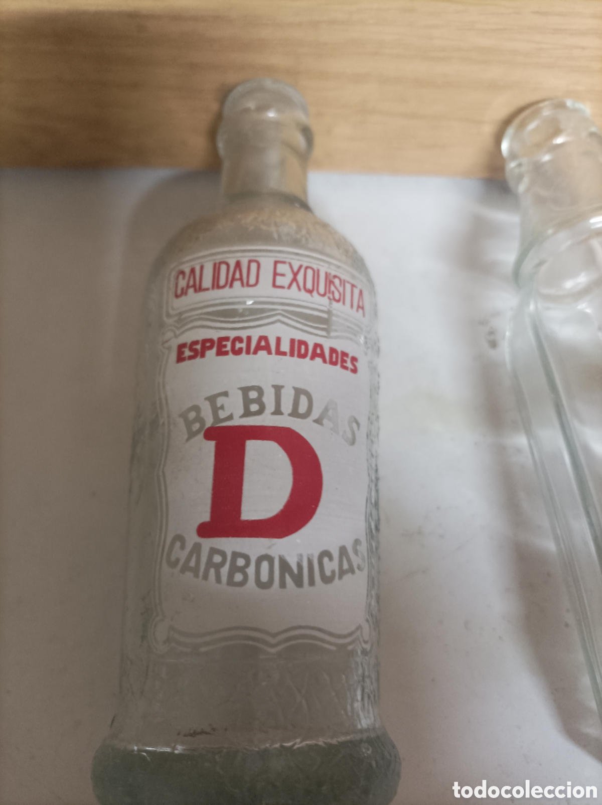 Botellas antiguas: Lote de siete botellas de bebidas - Foto 4