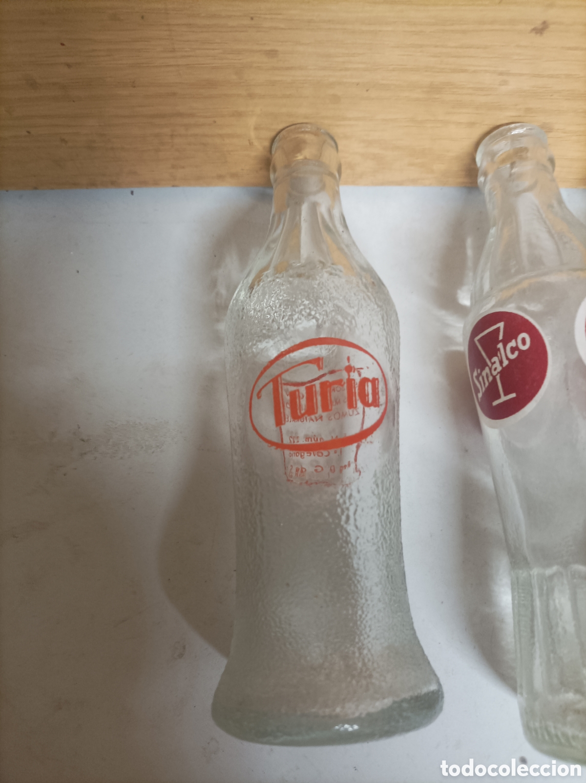 Botellas antiguas: Lote de siete botellas de bebidas - Foto 6