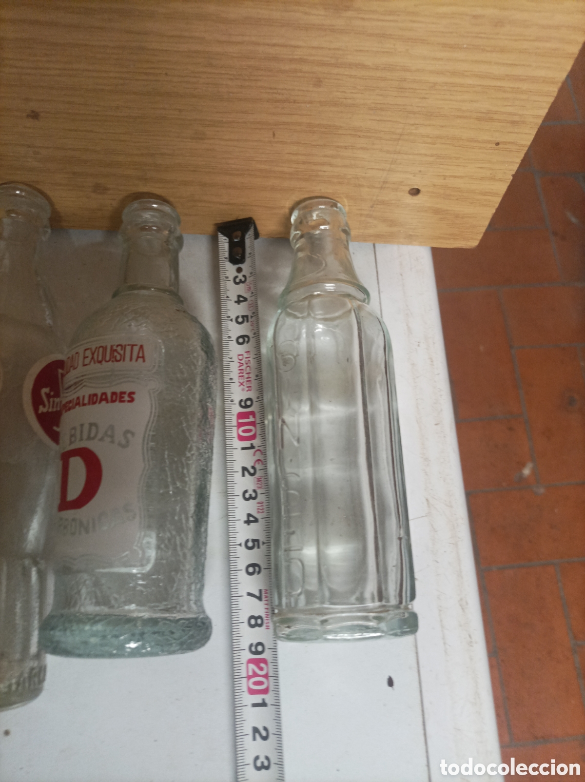 Botellas antiguas: Lote de siete botellas de bebidas - Foto 12