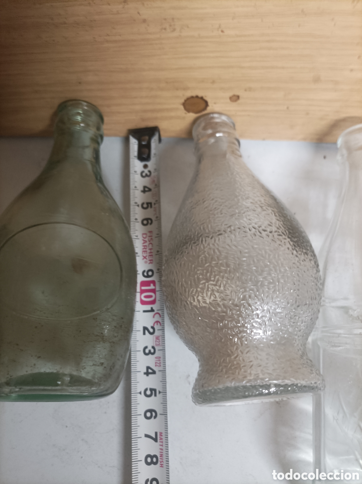 Botellas antiguas: Lote de siete botellas de bebidas - Foto 13