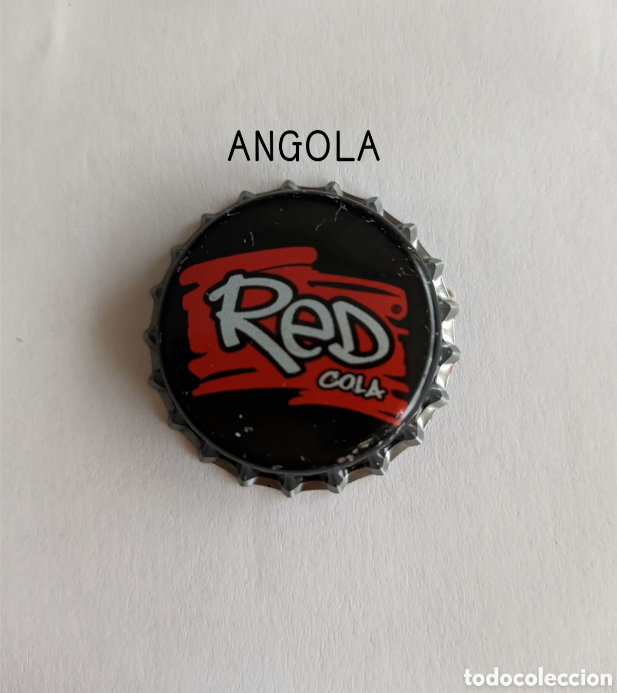 Botellas antiguas: Chapa corona sin usar de Angola - Foto 1