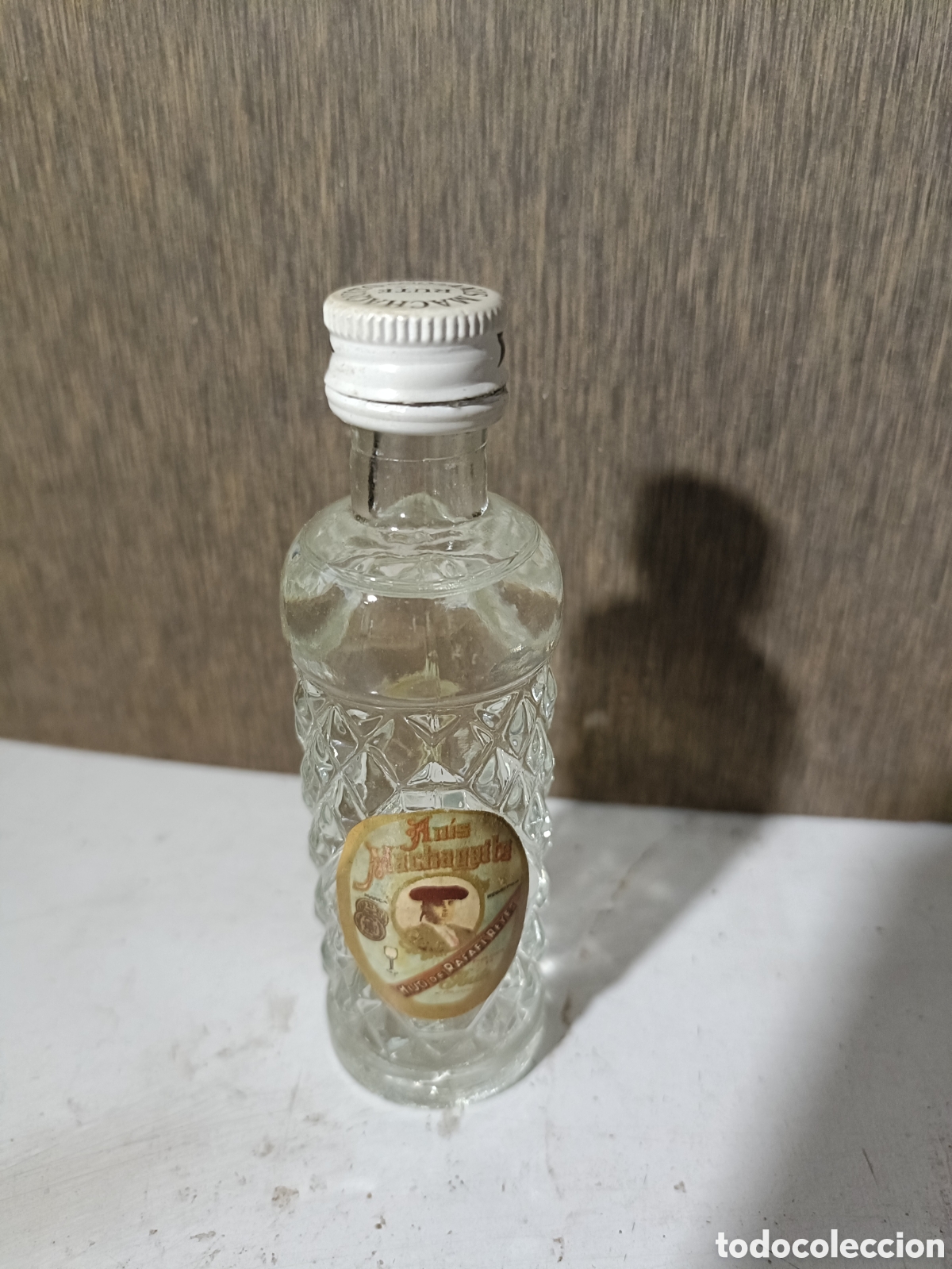 Botellas antiguas: Mini botella d an&iacute;s Machaquita - Foto 1