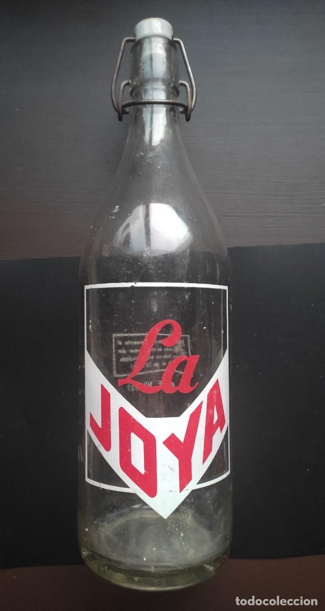 Botellas antiguas: BOTELLA ESPUMOSOS GASEOSA LA JOYA - Foto 1