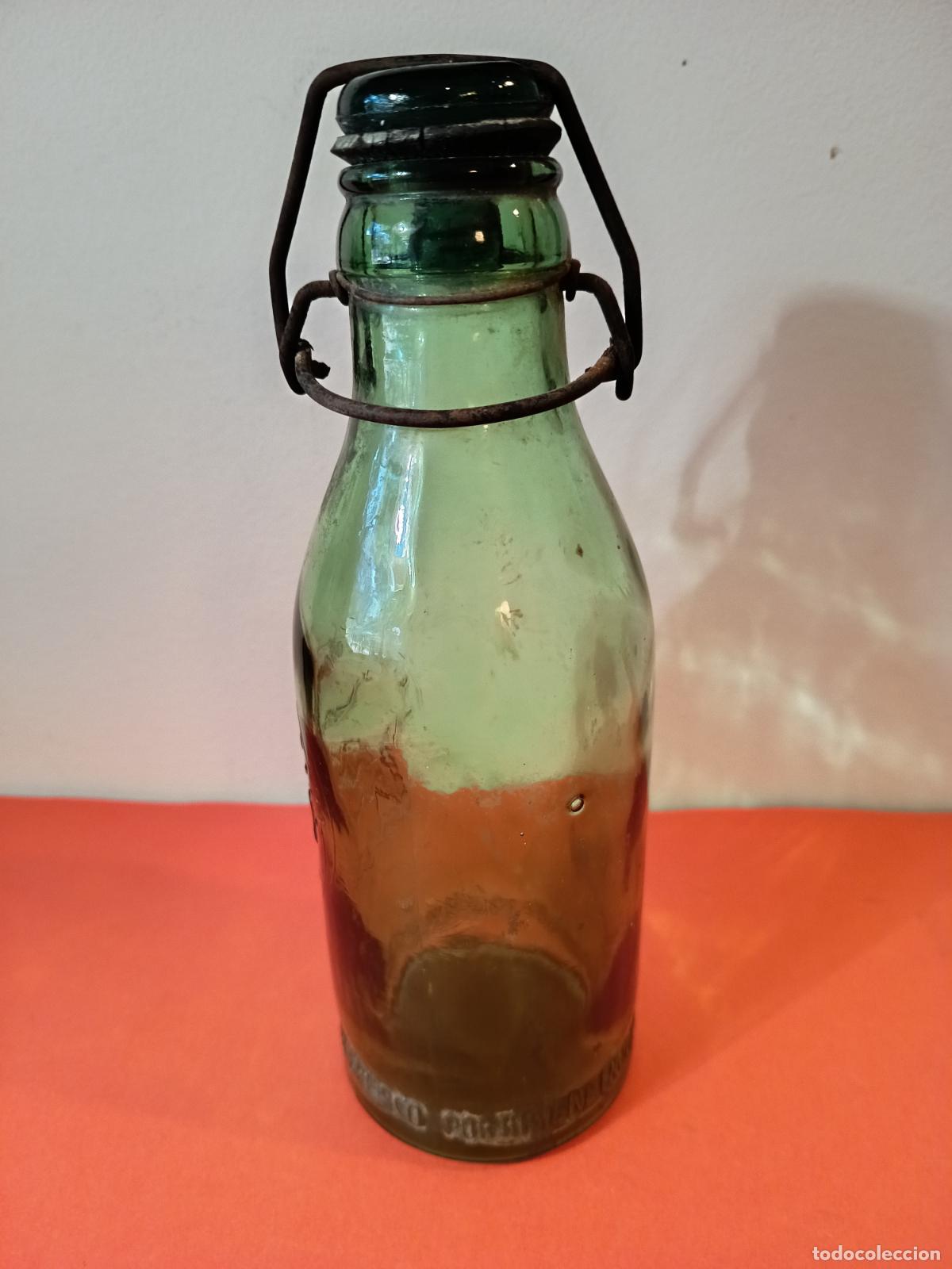 Botellas antiguas: BOTELLA DE LECHE CONDENSADA MARCA NUESTRA PUIGCERDA - Foto 5