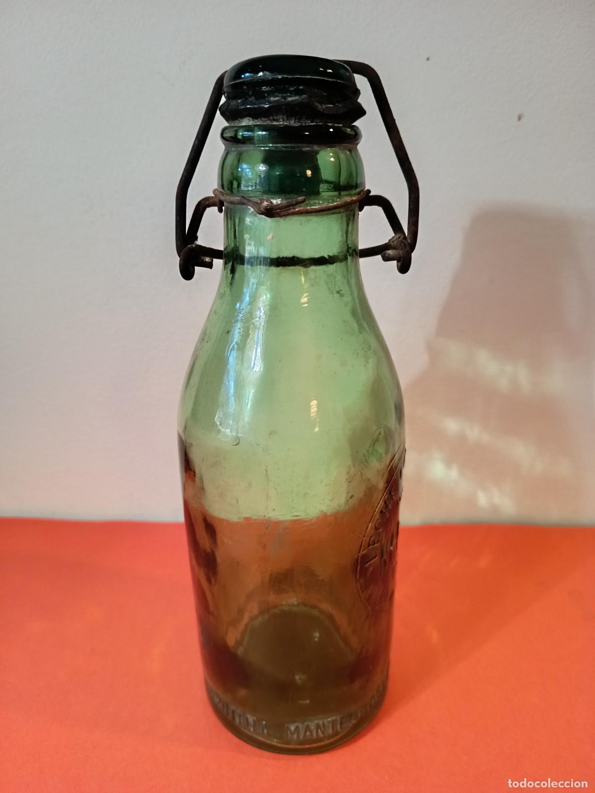 Botellas antiguas: BOTELLA DE LECHE CONDENSADA MARCA NUESTRA PUIGCERDA - Foto 6