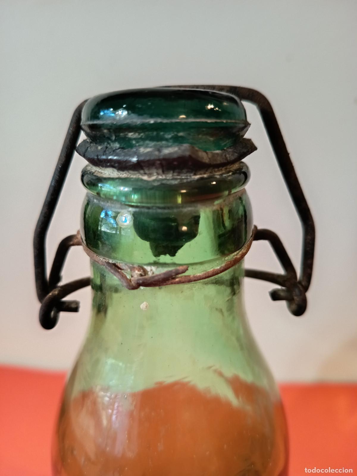 Botellas antiguas: BOTELLA DE LECHE CONDENSADA MARCA NUESTRA PUIGCERDA - Foto 7