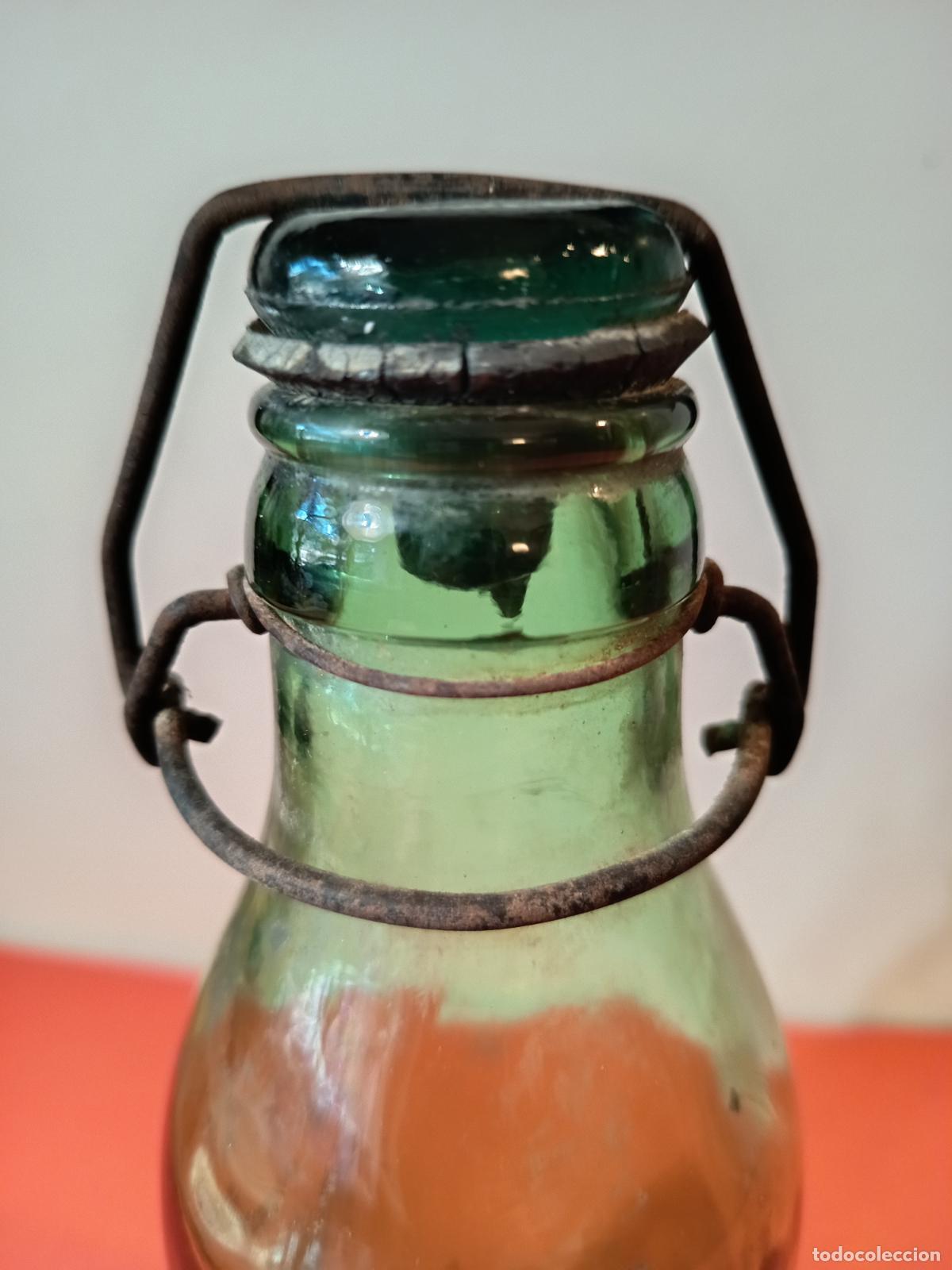 Botellas antiguas: BOTELLA DE LECHE CONDENSADA MARCA NUESTRA PUIGCERDA - Foto 8
