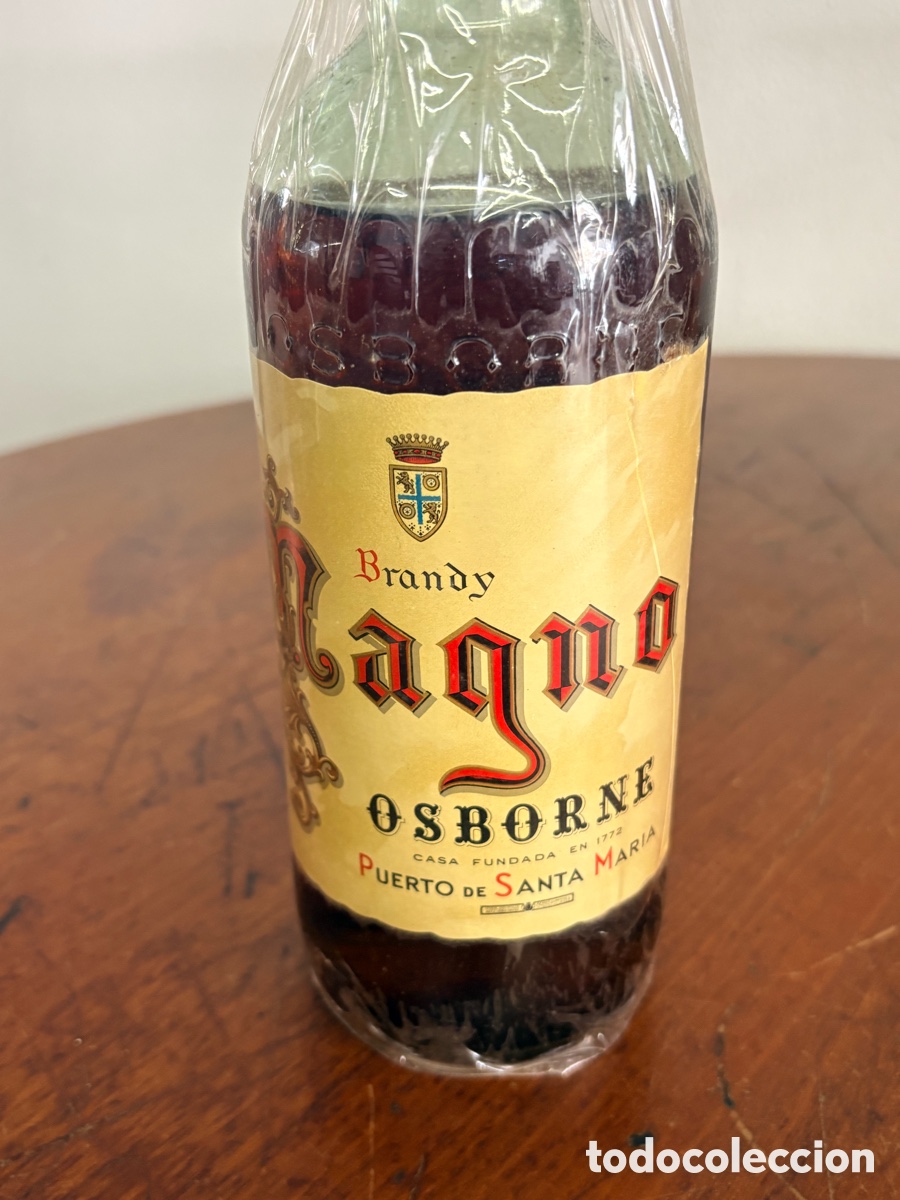 Botellas antiguas: Brandy Osborne precinto 4 pesetas - Foto 2