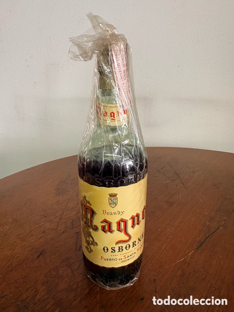 Botellas antiguas: Brandy Osborne precinto 4 pesetas - Foto 1