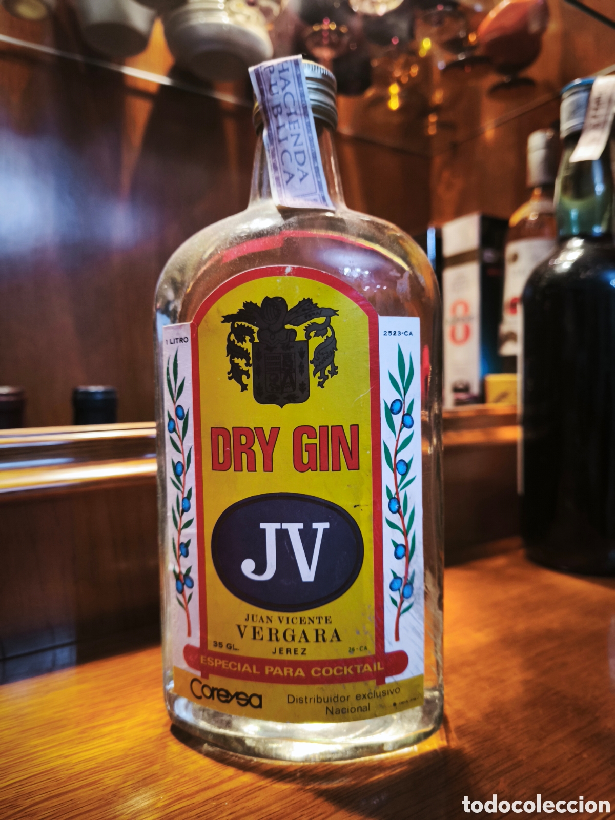 Botellas antiguas: Botella Ginebra Dry gin jv