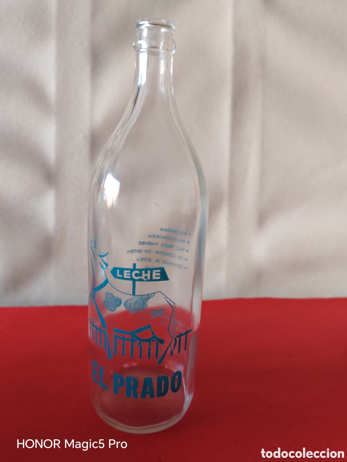 Botellas antiguas: Antigua botella de leche EL PRADO - Foto 1
