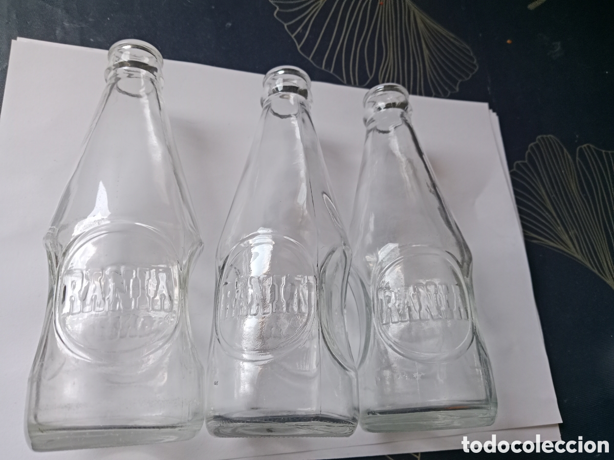 Botellas antiguas: 3 BOTELLAS DE LECHE RANIA , LETRAS EN RELIEVE