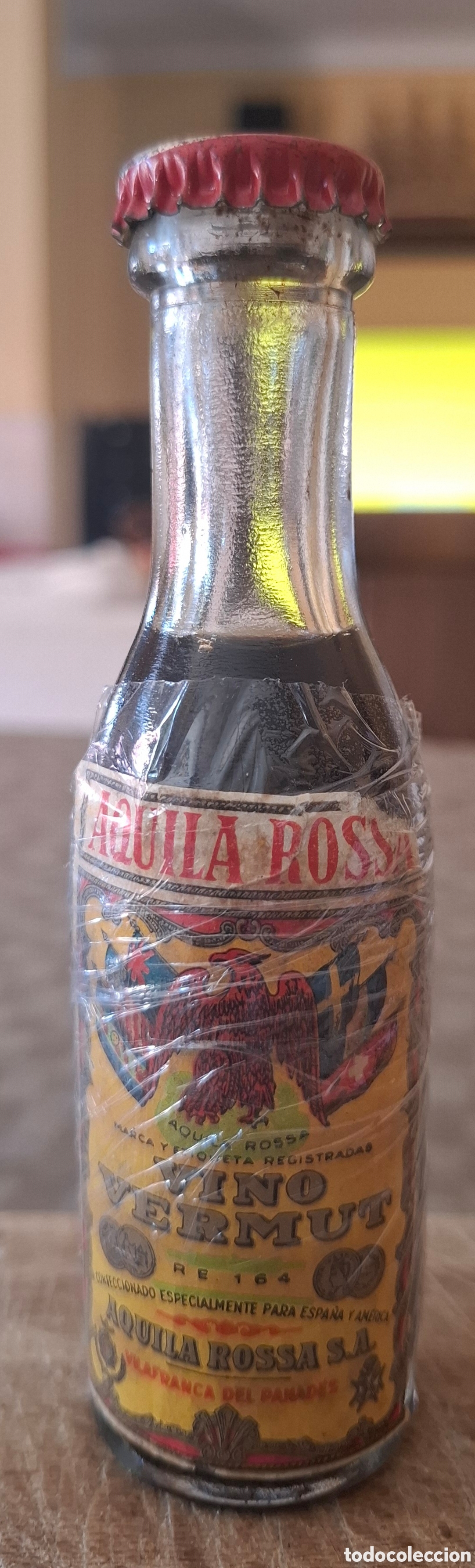 Botellas antiguas: Botellin vermouth Aquila Rossa