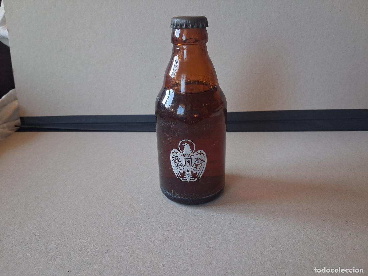 Botellas antiguas: Cerveza el &aacute;guila sin abrir - Foto 2