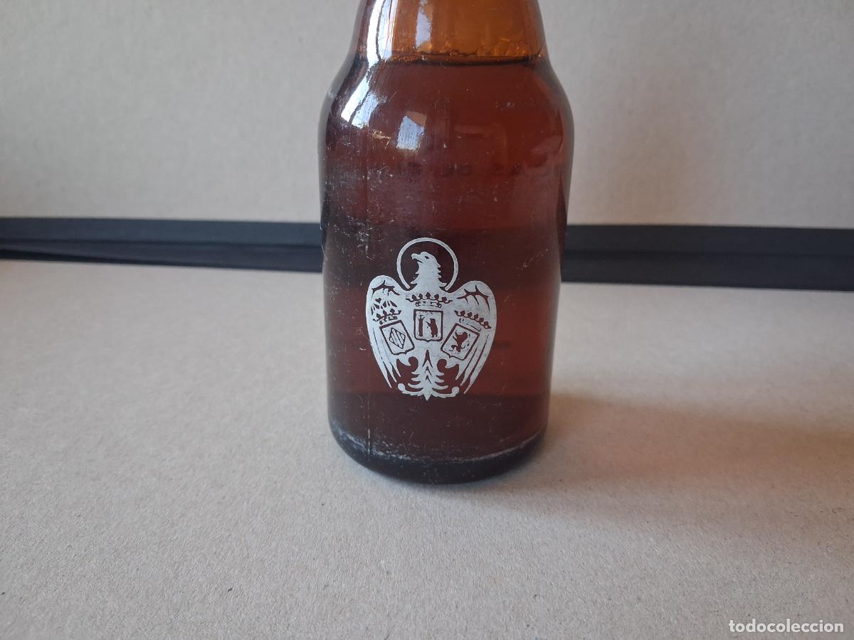 Botellas antiguas: Cerveza el &aacute;guila sin abrir - Foto 3