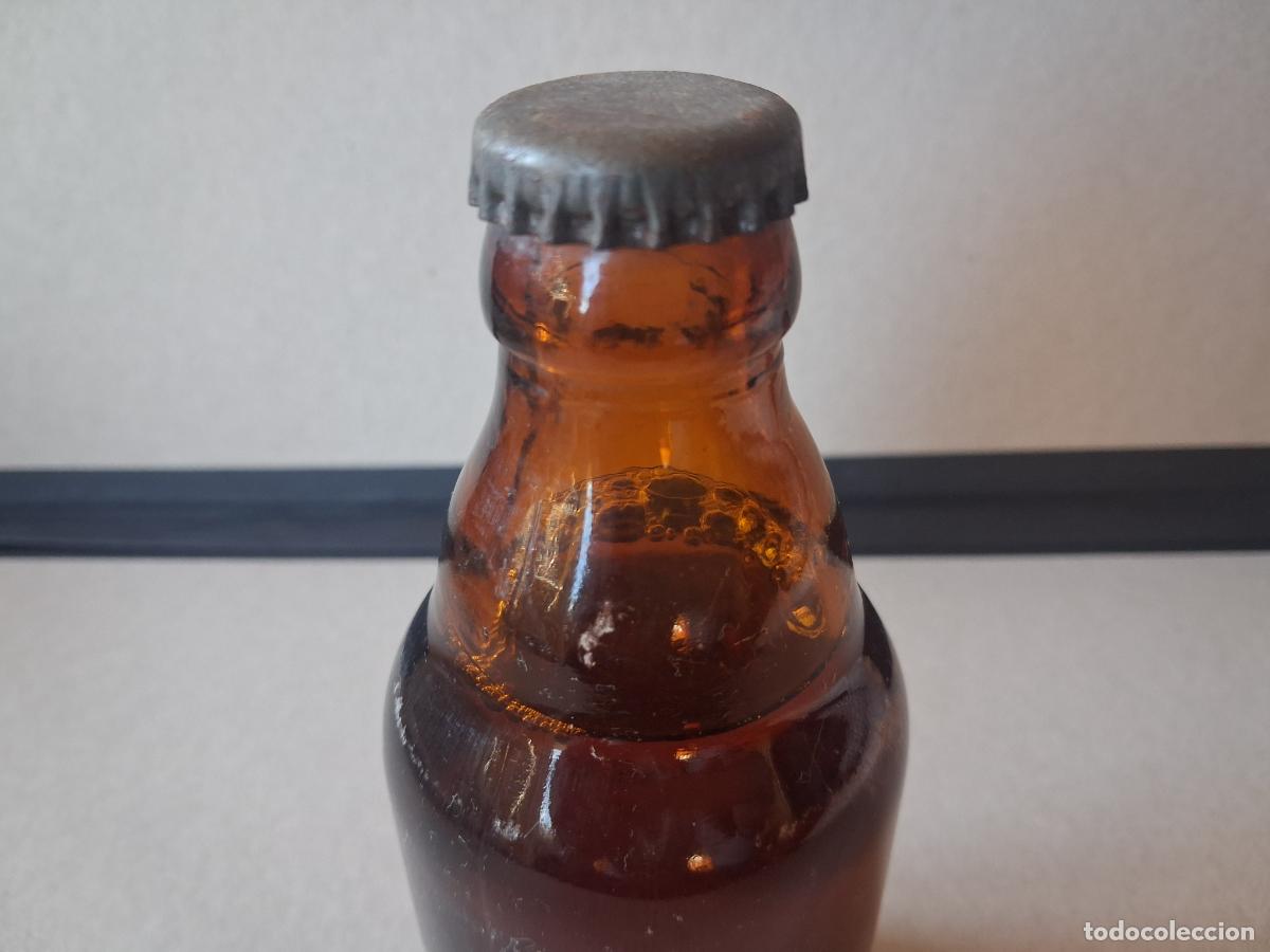 Botellas antiguas: Cerveza el &aacute;guila sin abrir - Foto 5