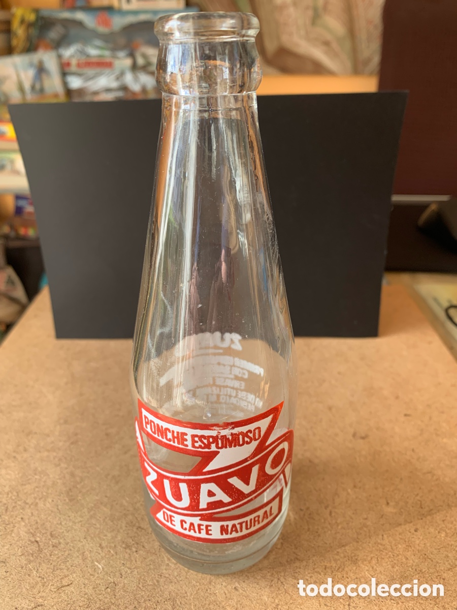 Botellas antiguas: BOTELLA DE PONCHE ESPUMOSO ZUAVO. A&Ntilde;OS 60.