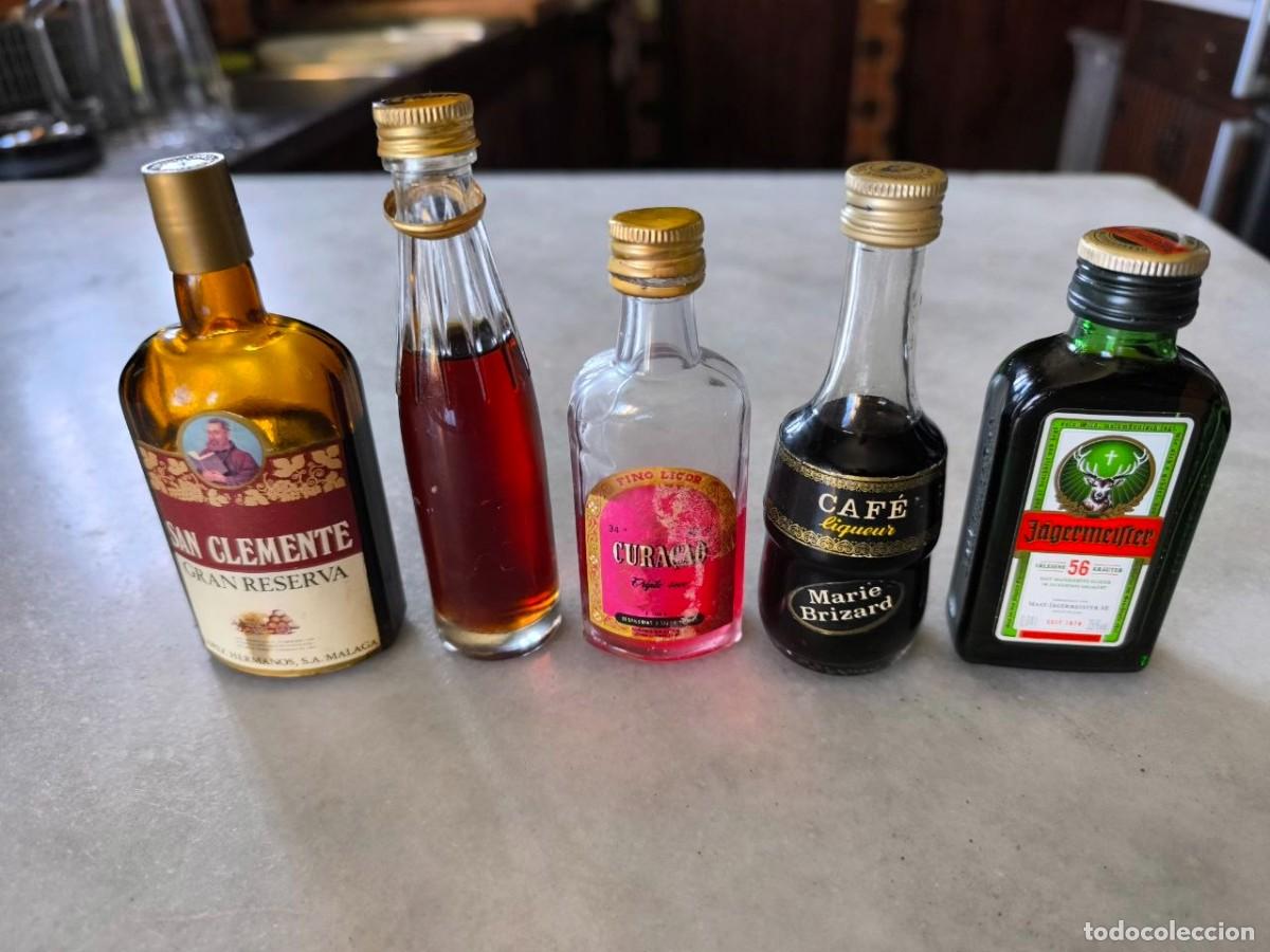 Botellas antiguas: 5 BOTELLINES, SAN CLEMENTE, CYNAR, M BRIZZAR CAFE, CURA&Ccedil;AO, JAGERMEIFFER