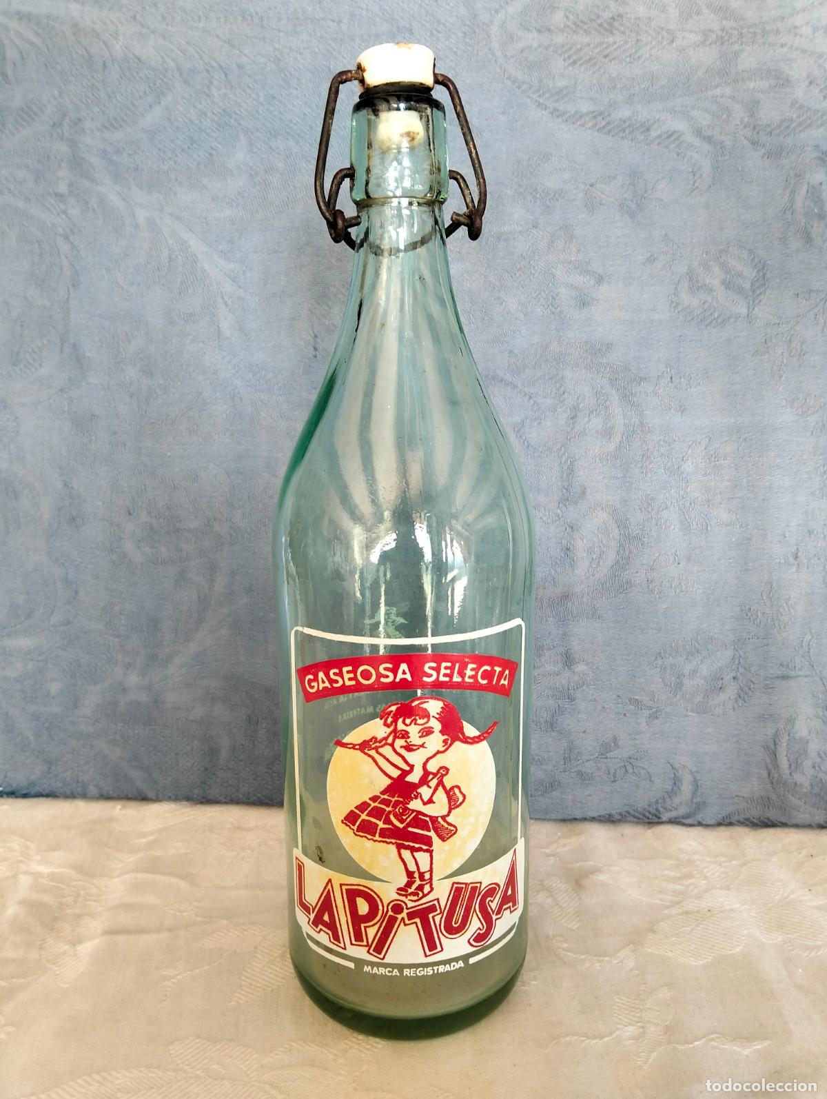Botellas antiguas: Botella de gaseosa antigua de cristal selecta La Pitusa marca registrada