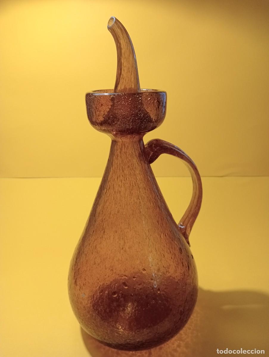 Botellas antiguas: Alcuza de vidrio soplado color caramelo