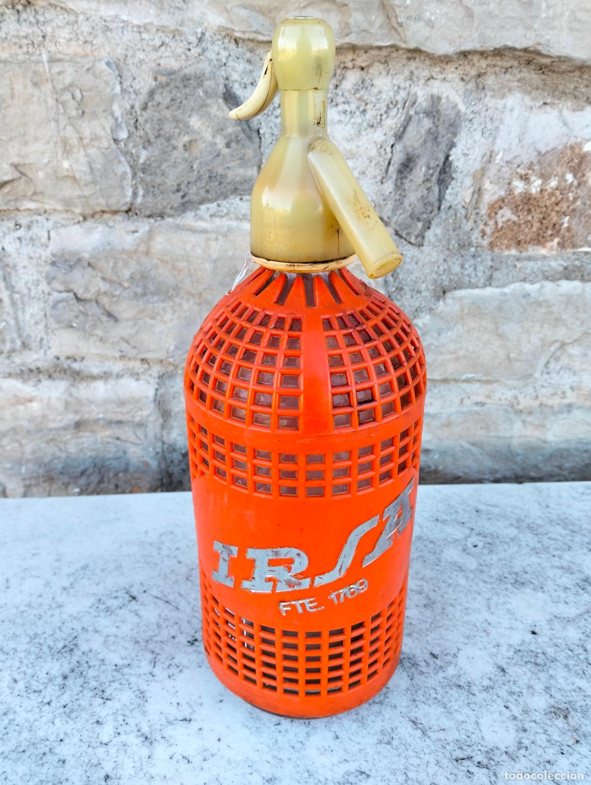 Botellas antiguas: Botella de cristal sif&oacute;n antiguo con malla naranja irsa fte 1769