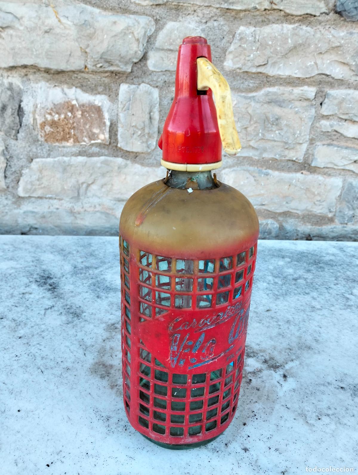 Botellas antiguas: Botella de cristal sif&oacute;n antiguo con malla roja carb&oacute;nicas vila arnan mollet
