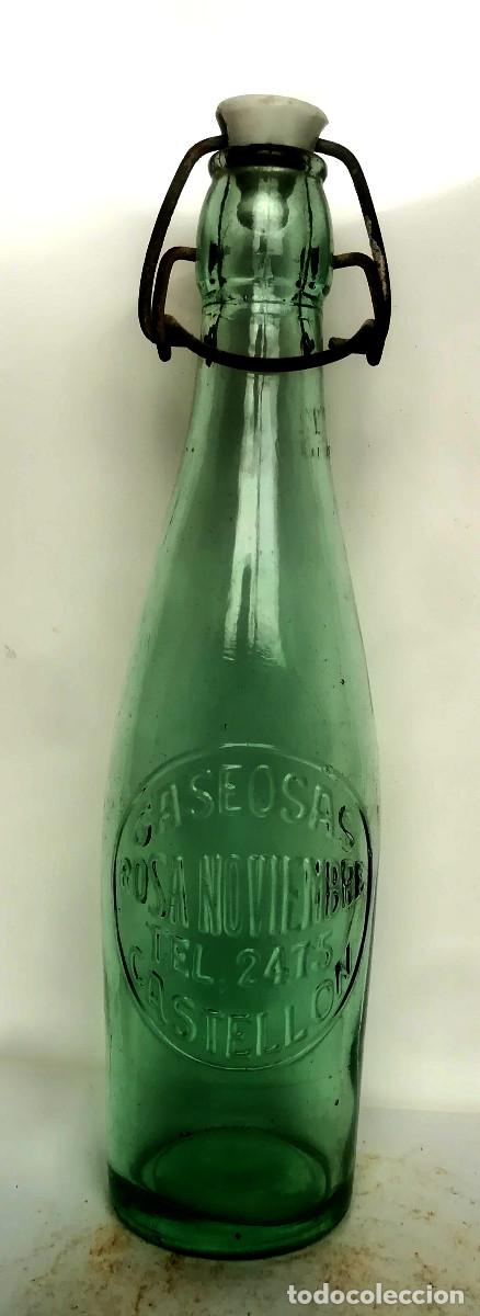 Botellas antiguas: Botell&iacute;n de gaseosa Rosa de Noviembre, (Castell&oacute;n) relieve
