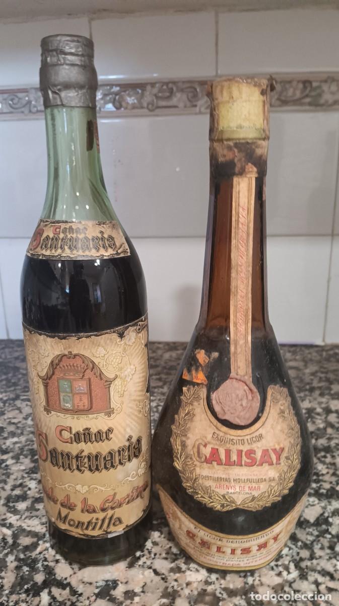 Botellas antiguas: Botellas co&ntilde;ac santuario y calisay tap&oacute;n corcho mollfulleda
